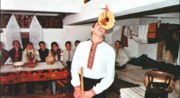 Man balancing hat on head
